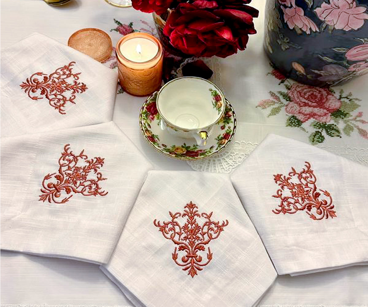 Set of 2024 tea cloth and four table napkins decorated with hand embroidery