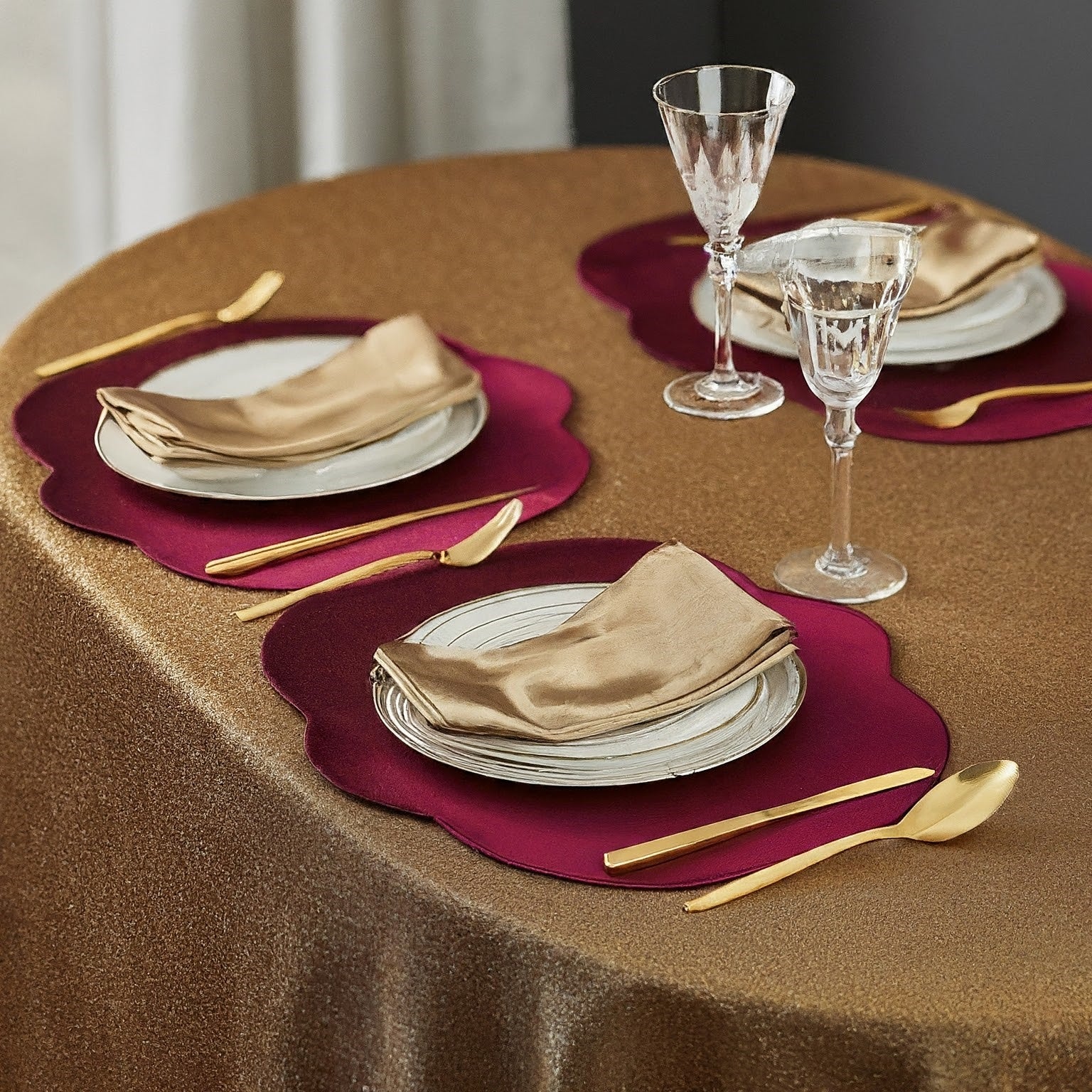Elegant placemats with charger plates for a formal dinner setting.