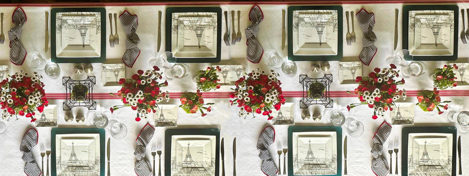 Beautiful kitchen and dining setup featuring tablecloths, napkins, and placemats.