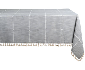 Classic plaid tablecloth with tassel trim, adding a touch of farmhouse charm to your table.