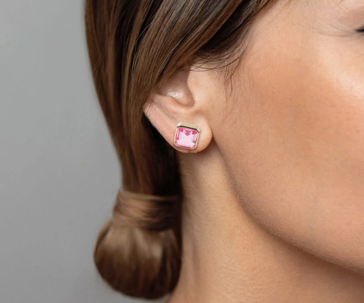 Asscher-cut 10mm pink tourmaline stud earrings set in 18K gold-plated brass with secure push-back closure, elegant and feminine design.