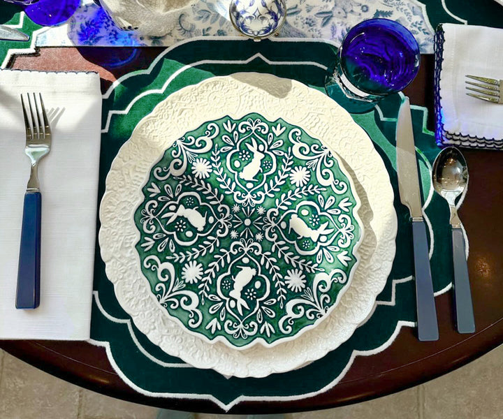 Oval placemats arranged on a dining table, highlighting their shape and design.