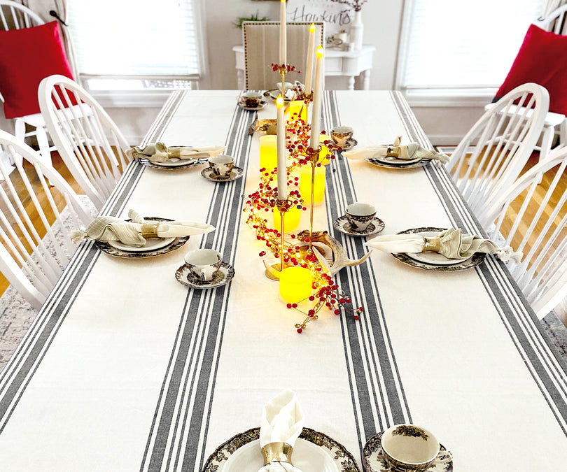 Blue and white striped tablecloth on a dining table