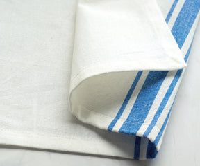 Machine-washable cotton dinner napkins with a rustic blue stripe pattern