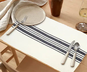 Farmhouse style Navy Blue Country Striped Placemats, rolled and ready for use.