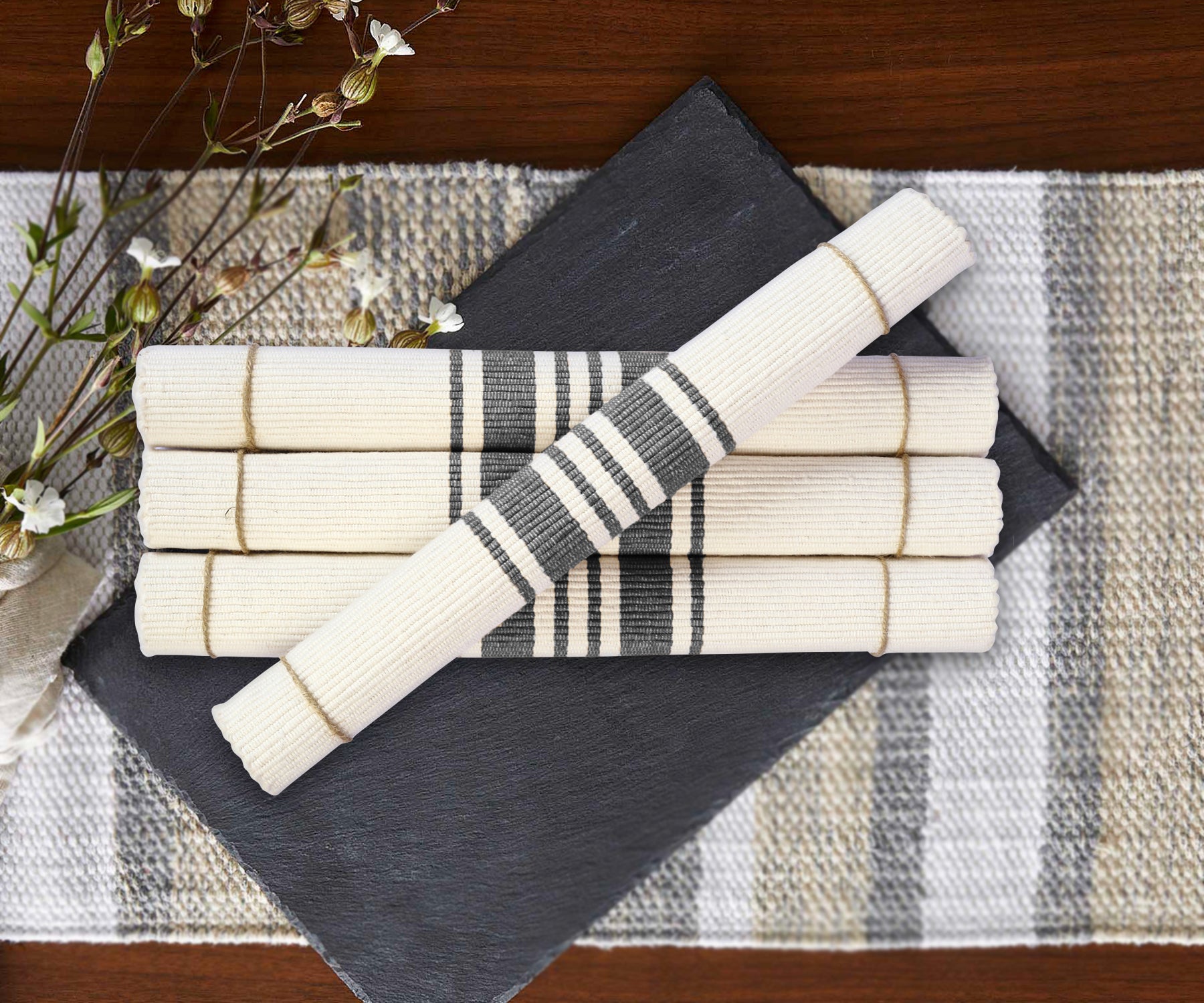 Set of four rolled Navy Blue Country Striped Placemats with textured white fabric