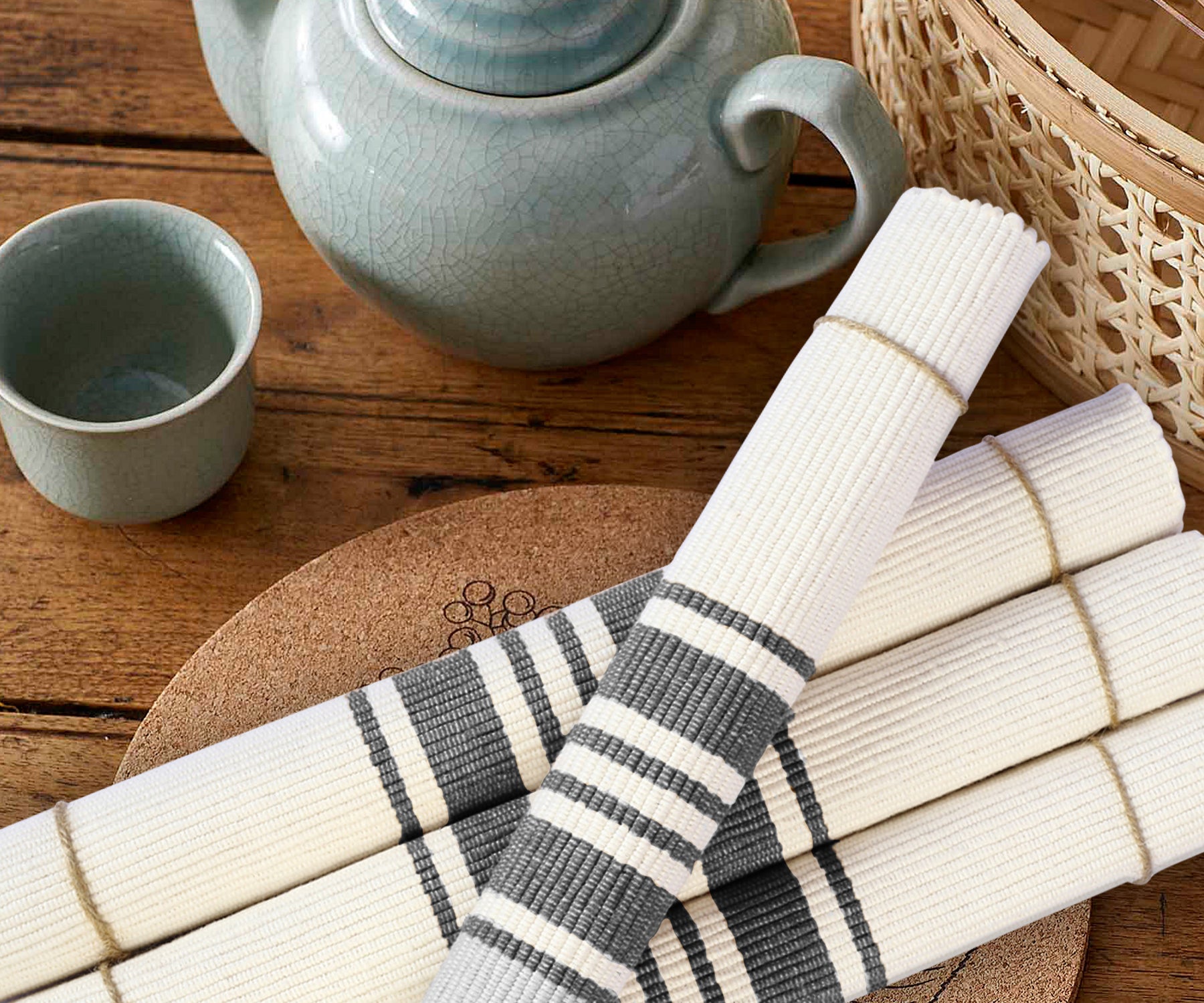 Rolled Navy Blue Country Striped Placemats showing prominent dark blue stripes.