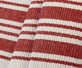 Red woven cloth placemats for farmhouse table setting