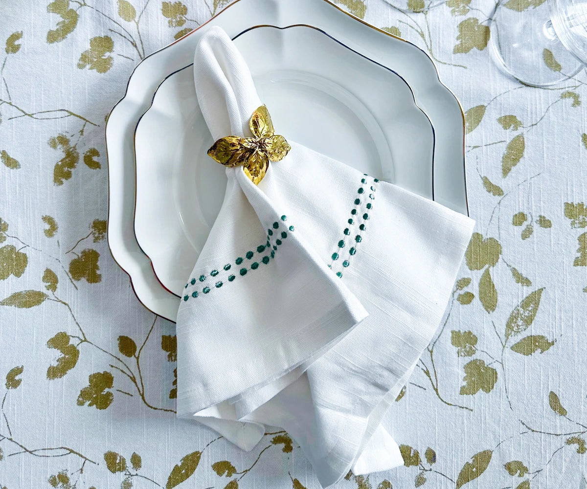 Green linen dinner napkins elevate your formal dining experience