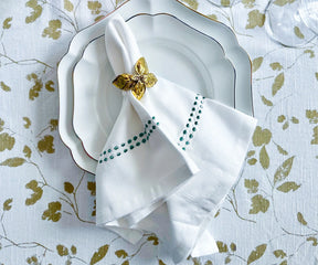 Green linen dinner napkins elevate your formal dining experience