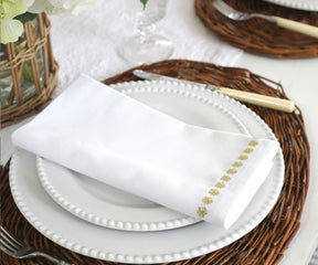 White napkins folded neatly on a table