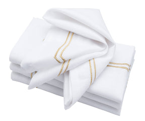 Luxurious white napkin accented with a gold trim border