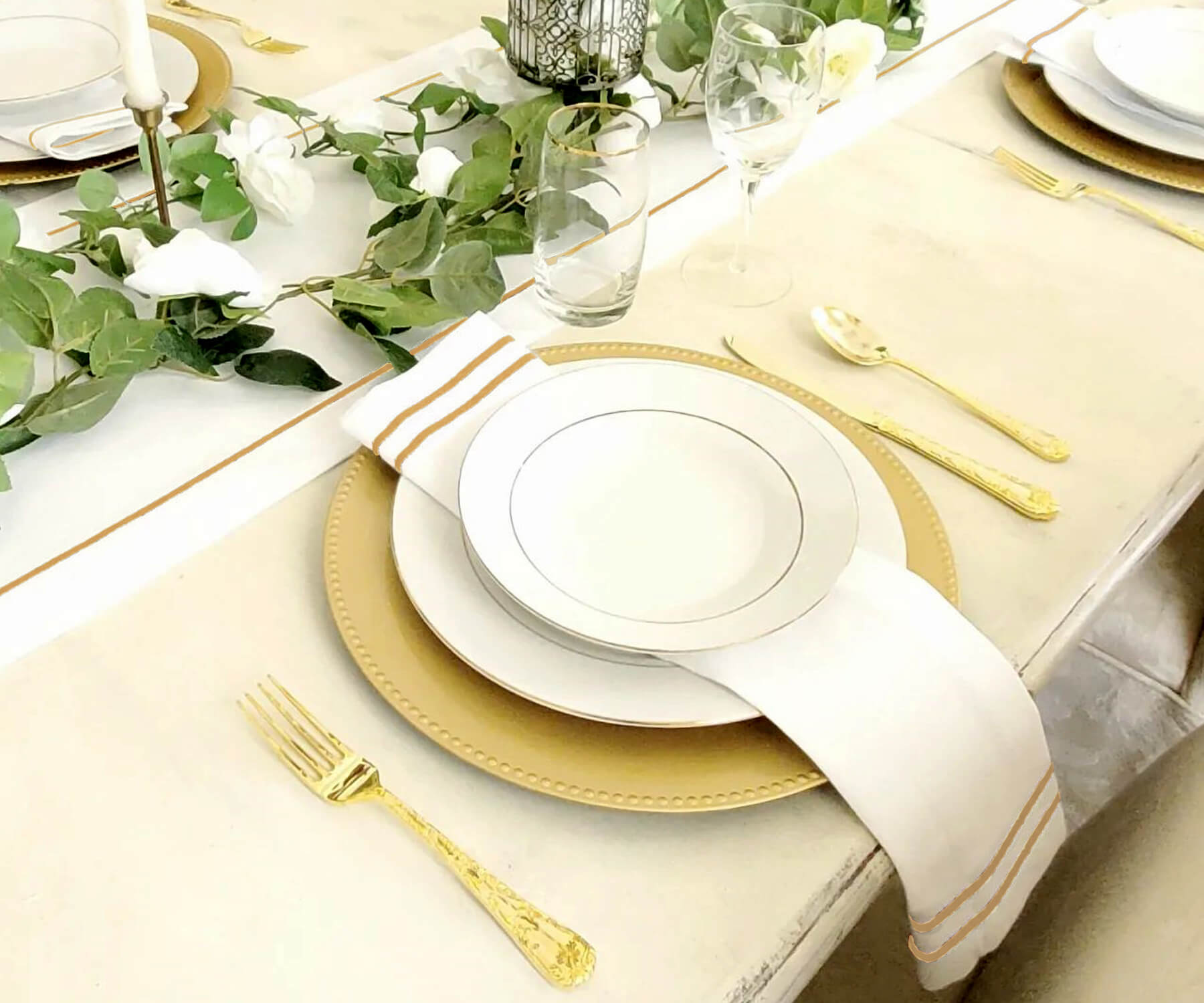 Gold dinner napkin adorned with a decorative trim