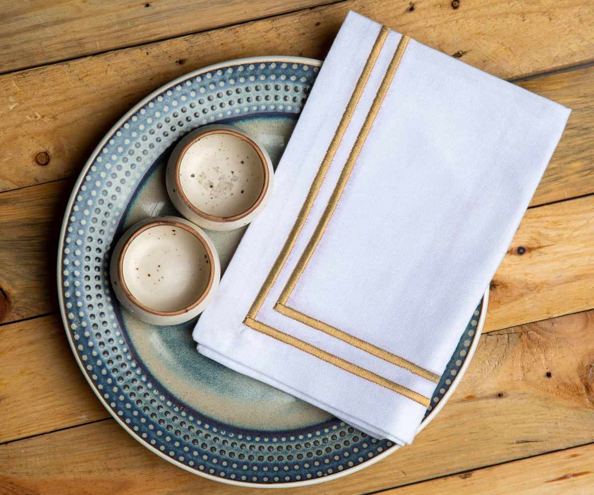 White napkin with a refined decorative trim