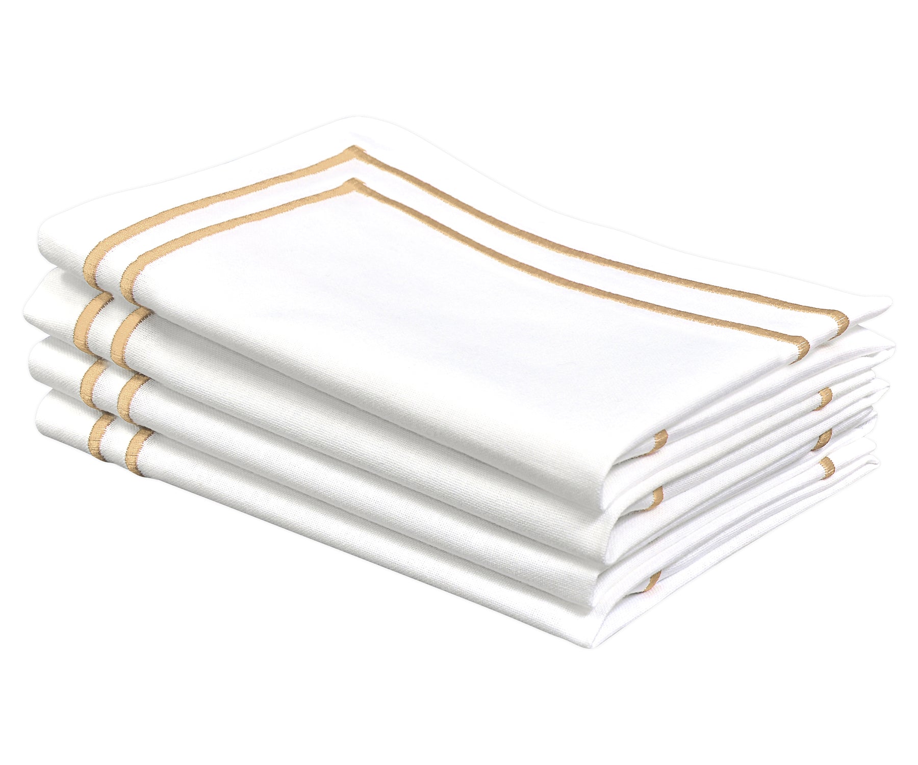 Elegant table setting with white dinner napkins with gold line embroidery.