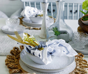 White cotton napkin with elegant embroidery 