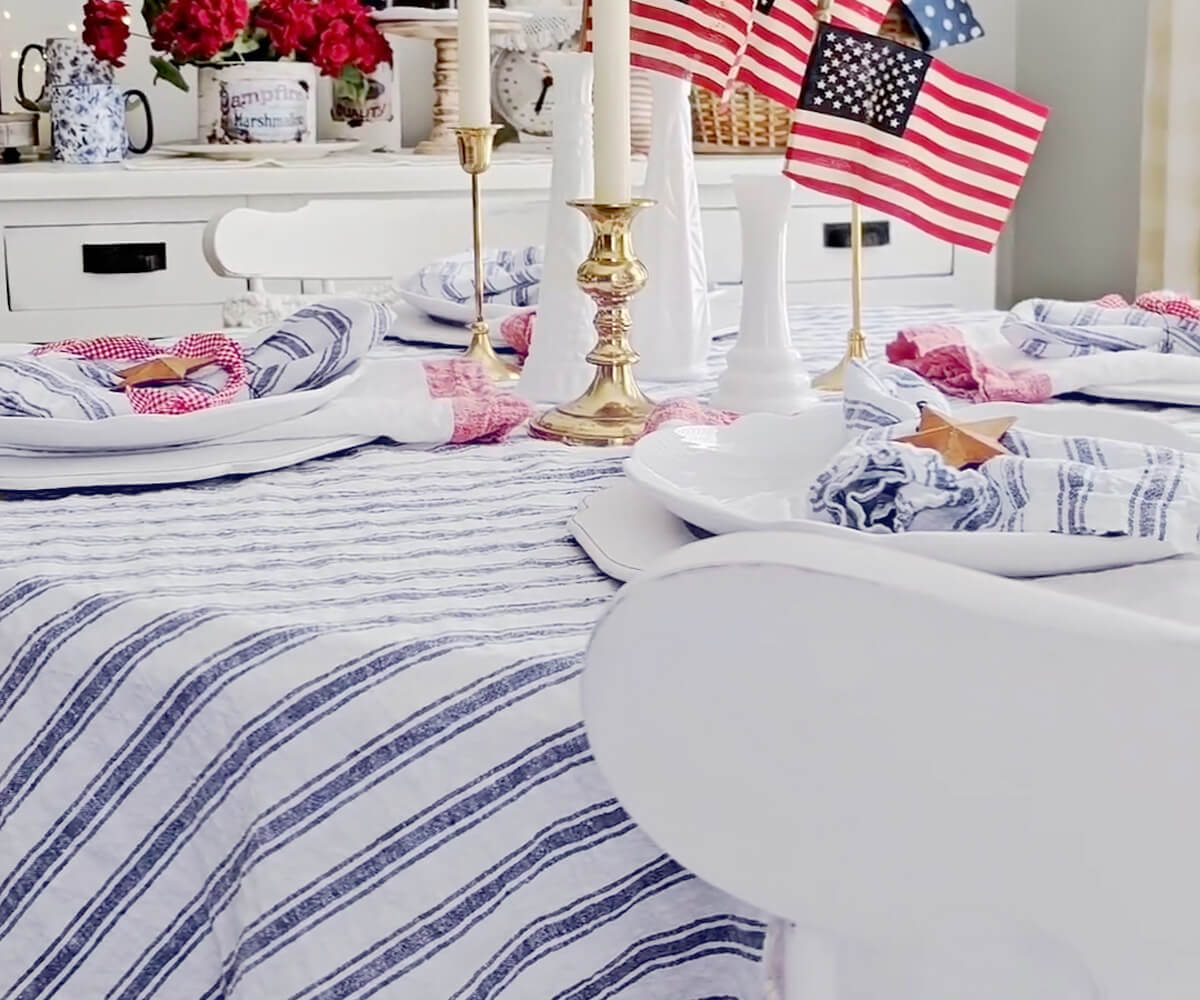 Striped tablecloth for a stylish and chic table setting.