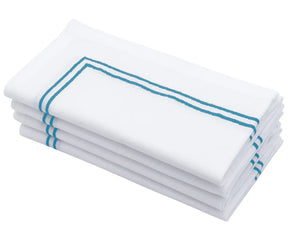 Light blue napkin with double line embroidery.