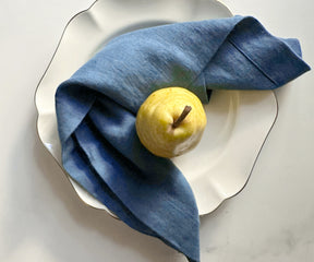 Plain vintage blue linen dinner napkin for an elegant and timeless dining look.