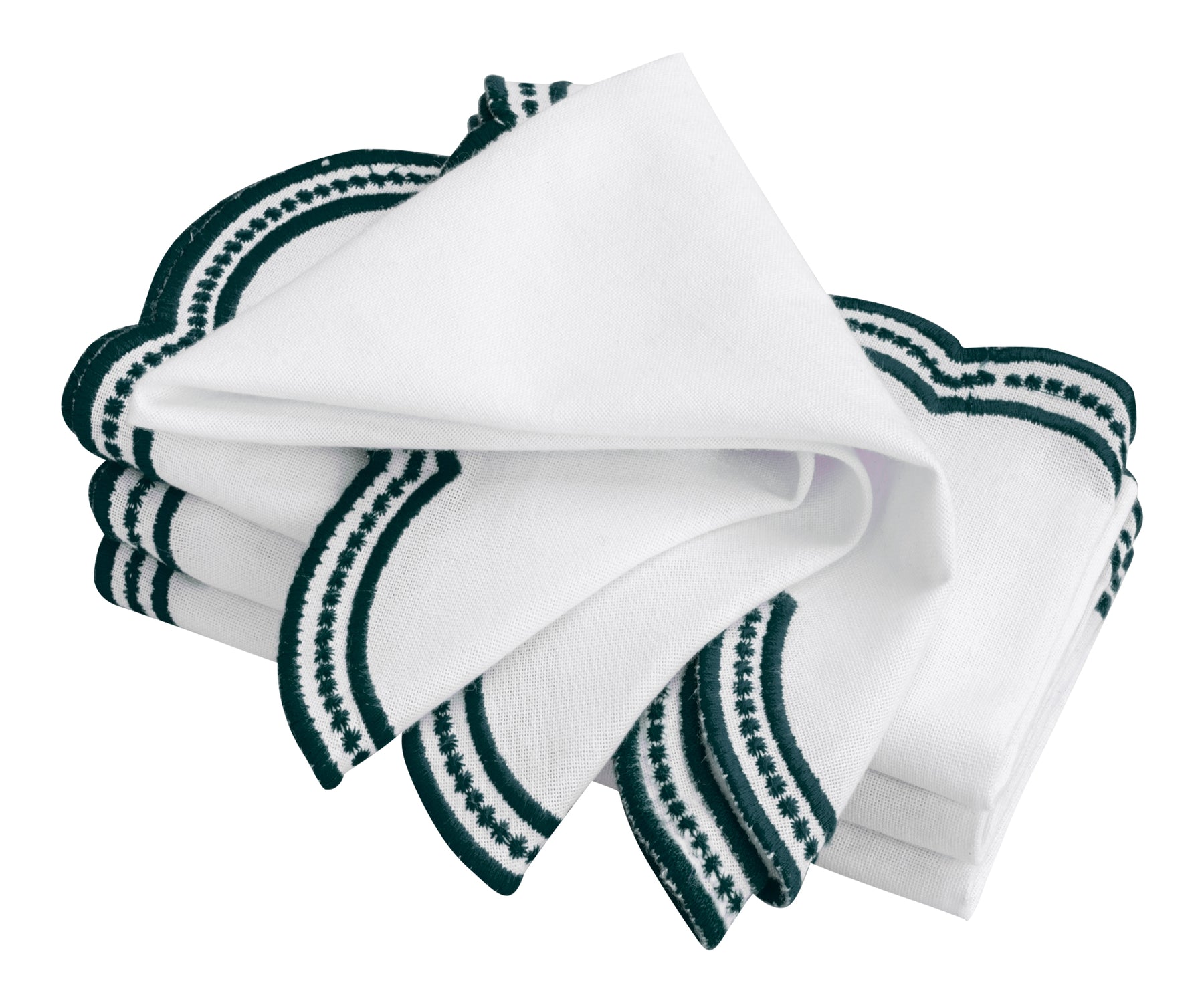 Elegant white napkins with green scalloped embroidery, neatly folded for a refined table setting.