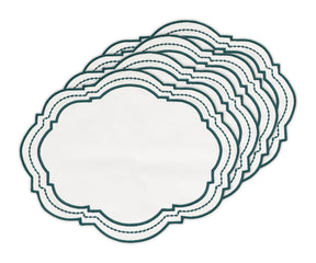 Charming oval table placemats with a whimsical polka dot design, ideal for casual dining setups.