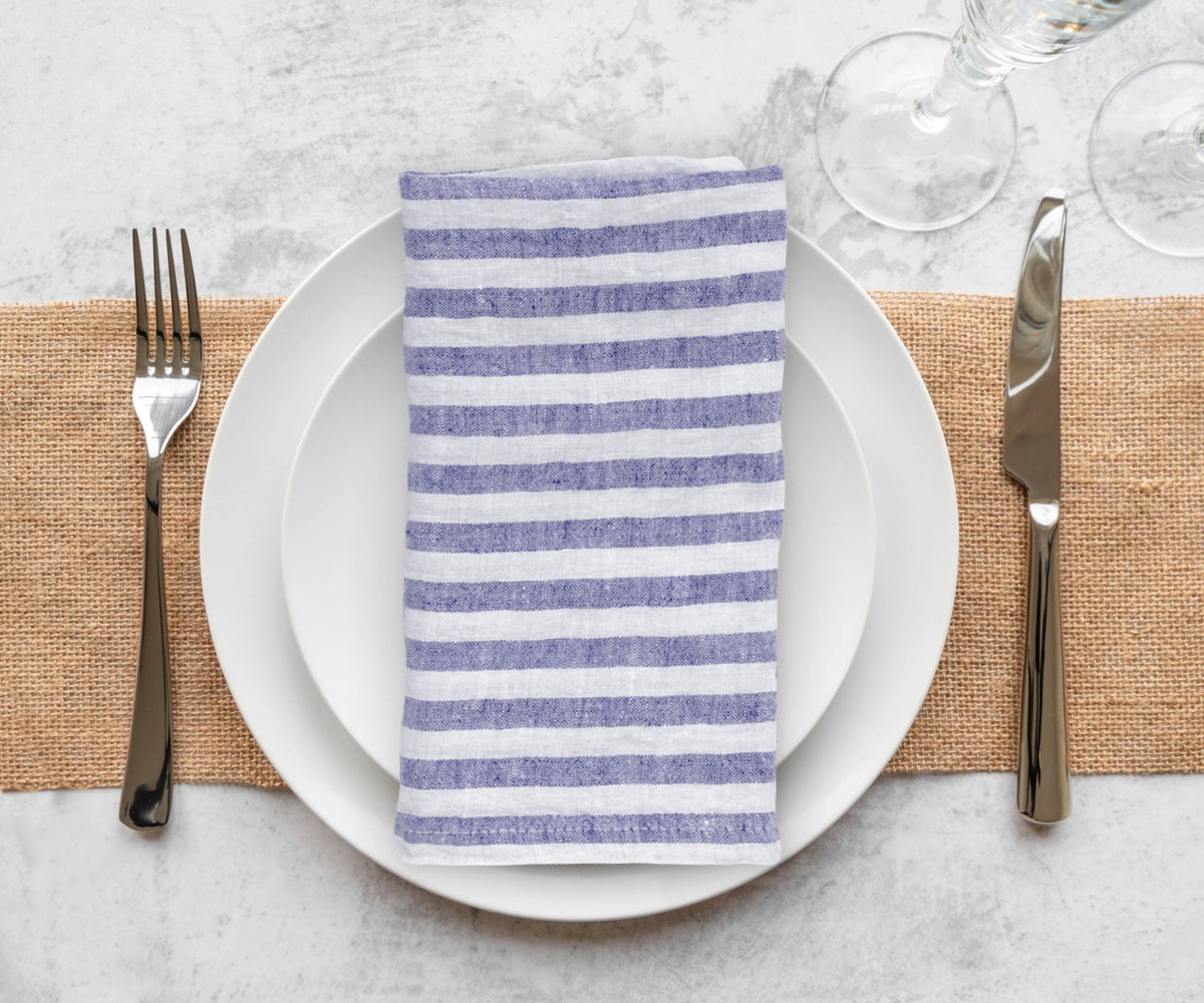 Blue and white dinner napkins for a formal event