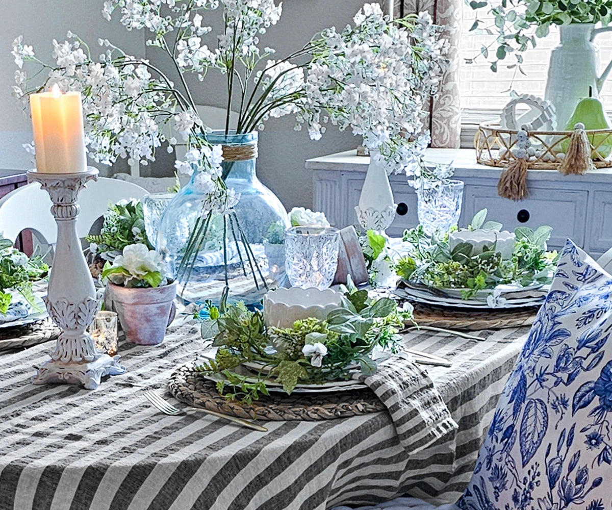 Black linen napkins in soft, neatly arranged on a dining table, and elegant design.