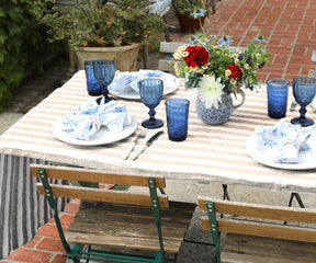 Linen outdoor holiday tablecloth for festive gatherings in the garden.