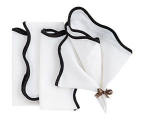 white cloth napkins, perfect for formal dining or casual meals.