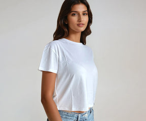 Trendy revealing white crop top with a flattering design