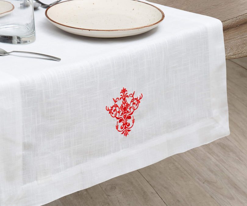 Elegant table runner placed down the center of a dining table.